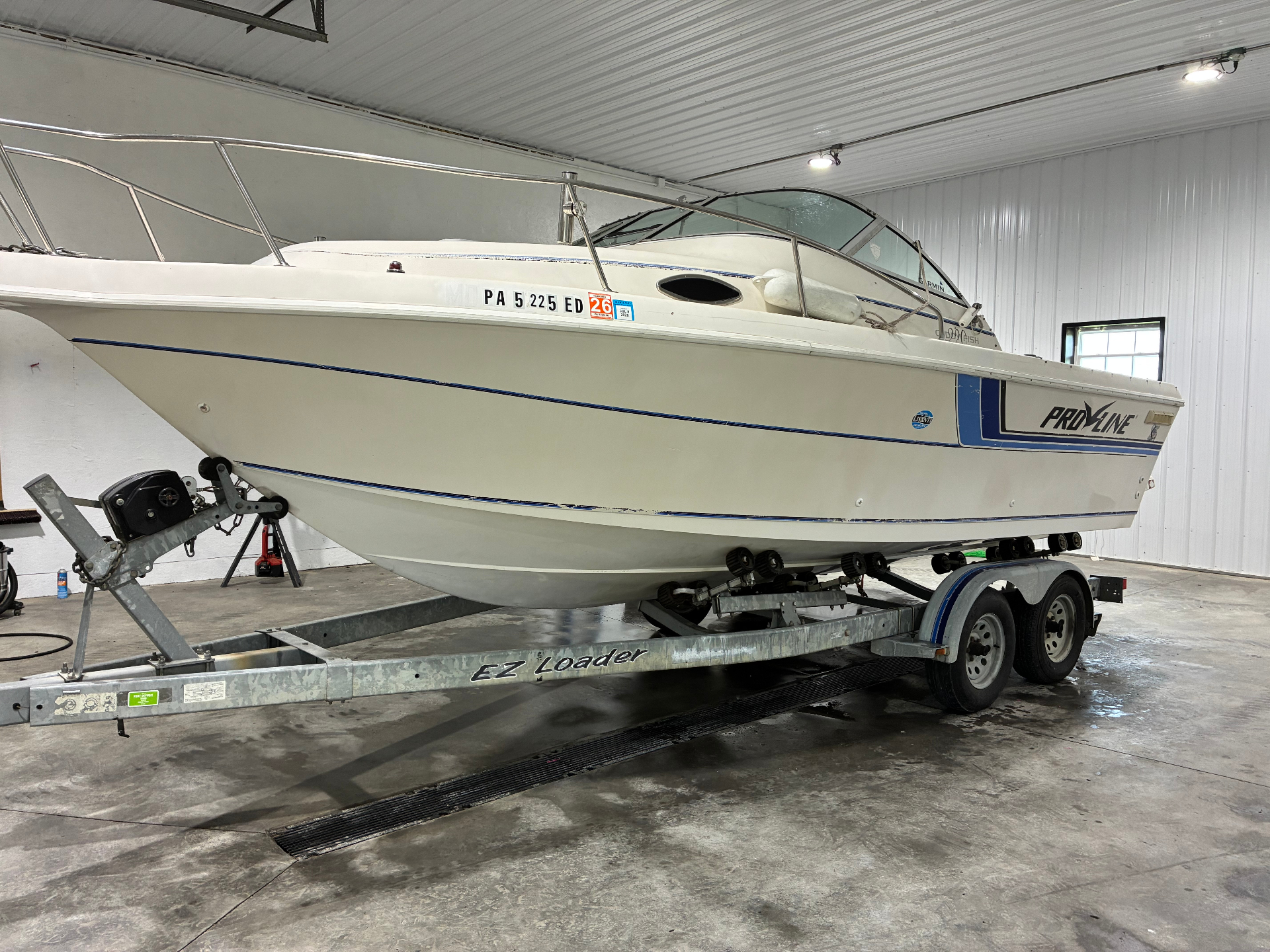 ProLine boat on EZ Loader trailer ready for gelcoat restoration